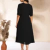 Abito a trapezio in chiffon dobby nero con design personalizzato 