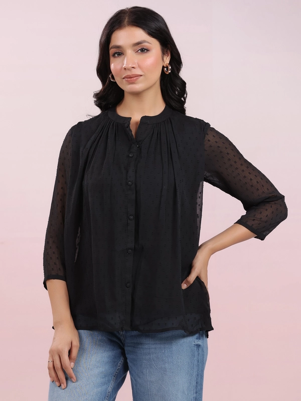 Top in chiffon Dobby nero con design personalizzato