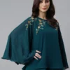Top a trapezio decorato in georgette blu acquamarina