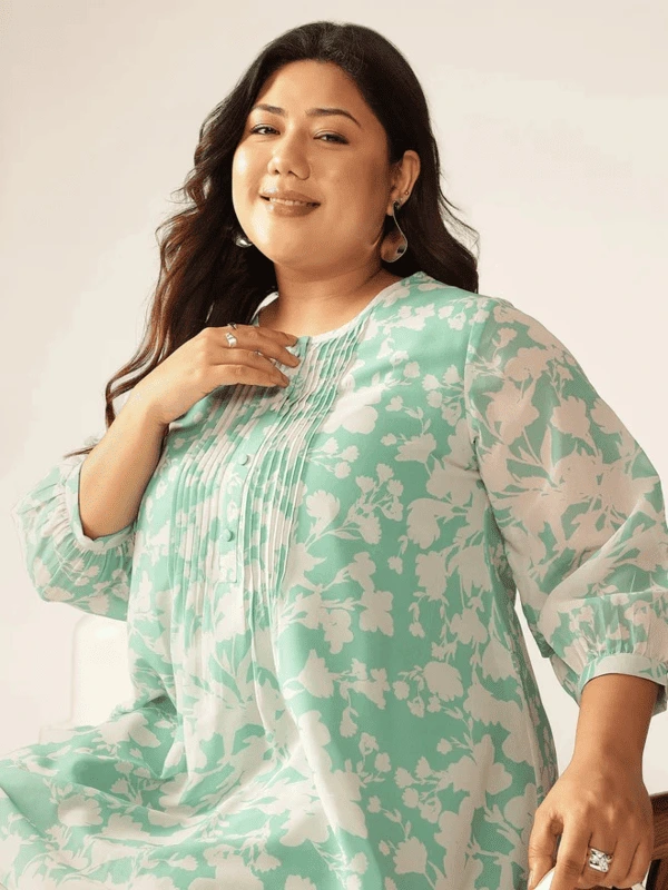 Tunica a trapezio in georgette verde con stampa floreale