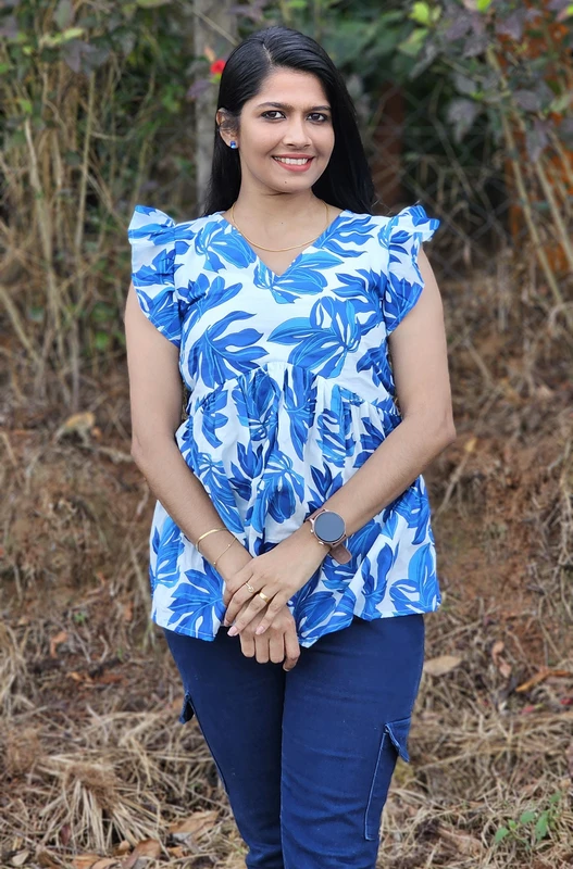 Top Peplum Floreal – Morbidezza e Stile in Cotone